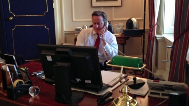 David Cameron speaking by phone to Gavin Short