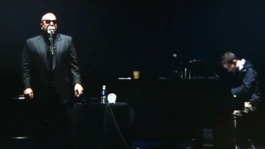 Billy Joel, accompanied by student Michael Pollack