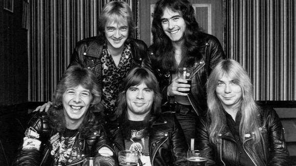 Clive Burr pictured bottom left with fellow band members.