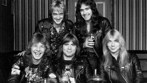 Clive Burr pictured bottom left with fellow band members.