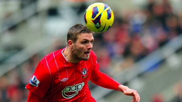 Jos Hooiveld of Southampton gets stuck in at the back