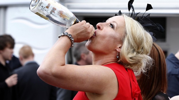 A racegoer on Ladies' Day during day two of the 2012 John Smith's Grand National meeting at Aintree Racecourse, Liverpool