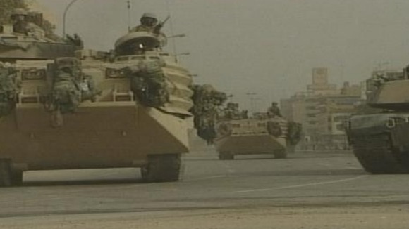 American troops arriving in Baghdad in April 2003
