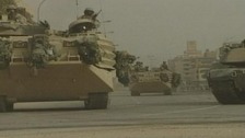 American troops arriving in Baghdad in April 2003