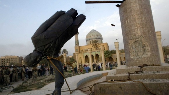 Saddam Hussein's statue is pulled down in central Baghdad