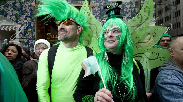 Revellers watch the St. Patrick's Day parade in New York.