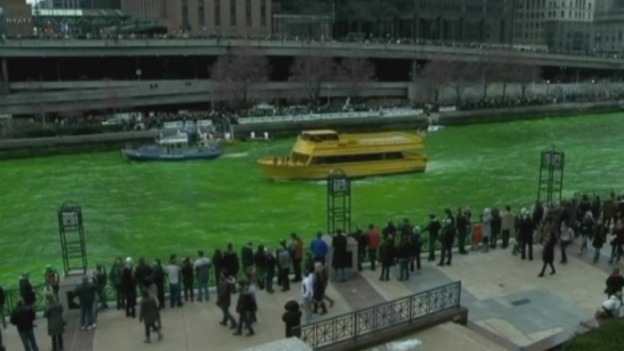 The crowds cheered as Chicago's river was dyed emerald green.