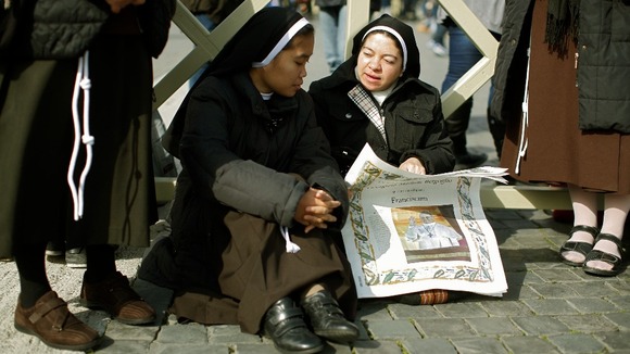 Nuns await the blessing of newly elected Pope Francis in St Peter's Square