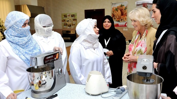 Duchess of Cornwall meets women who are learning cooking skills at the Bab Rizq Jameel Nafisa Shams Academy