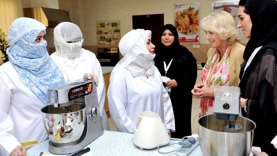 Duchess of Cornwall meets women who are learning cooking skills at the Bab Rizq Jameel Nafisa Shams Academy