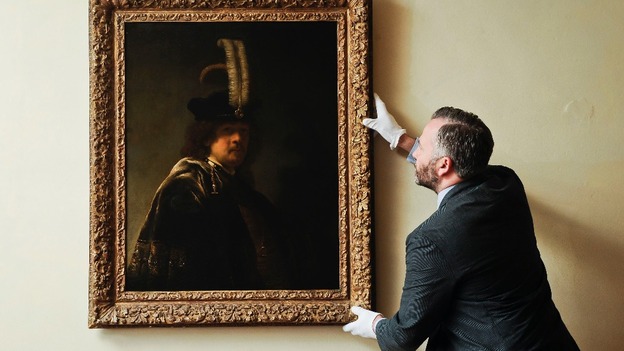 The Abbey's curator inspects the confirmed self-portrait.