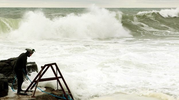 A man prepares to brave the cold waters in County Londonderry.