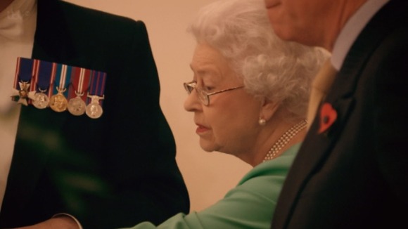 The Queen inspects the table before a state dinner