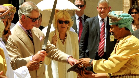 Prince Charles is given a traditional sword and shield