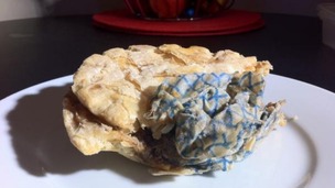 Beef and onion pie with a filthy rag cooked inside  