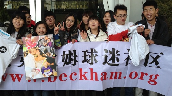 Fans waiting for David Beckham to arrive in Beijing