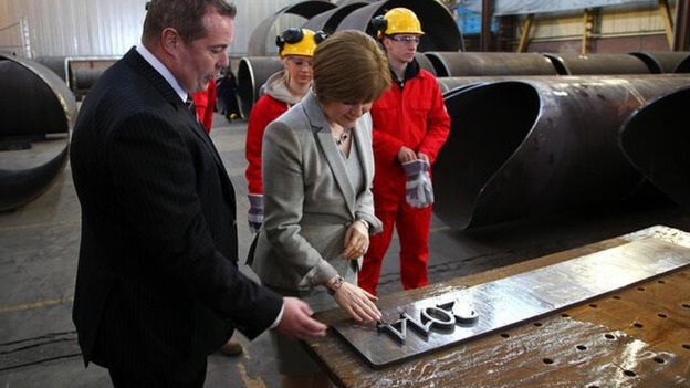 Deputy First Minister Nicola Sturgeon inspects the '2014' section of date.