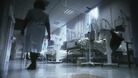 Nurse walking along in hospital ward