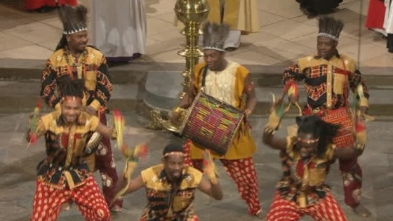 Dancers sing the African hymn An African hymn 'Gbeh Kpa Kpa Ba' - or 'A New Beginning'.