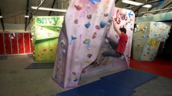Climber on a climbing wall.