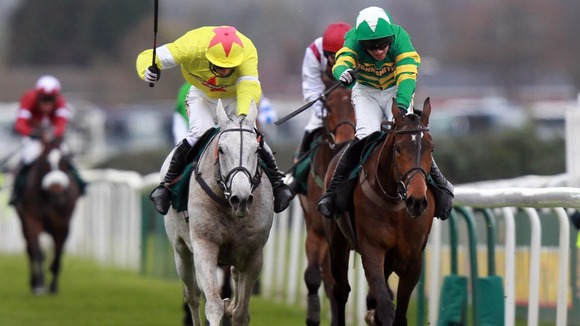 Neptune Collonges ridden by Daryl Jacobs (left) goes on to win during the John Smith's Grand National