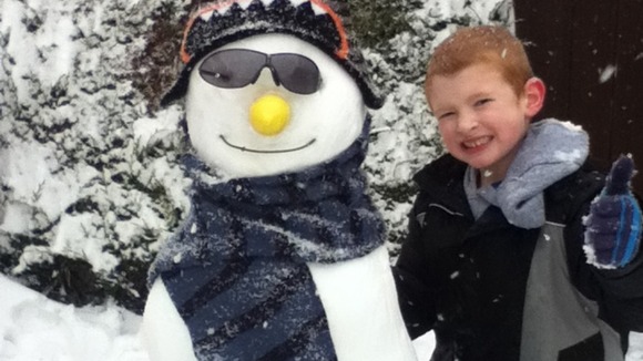Ollie Brunskill with snowman