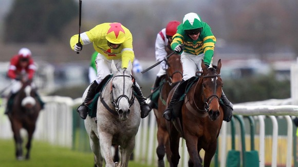Neptune Collonges ridden by Daryl Jacobs (left) goes on to win during the John Smith's Grand National