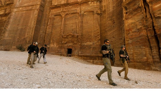Members of the US Secret Service Counter Assault Team check the President's route ahead of him
