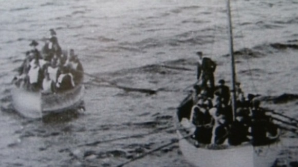Harold Lowe pictured at the helm of a lifeboat