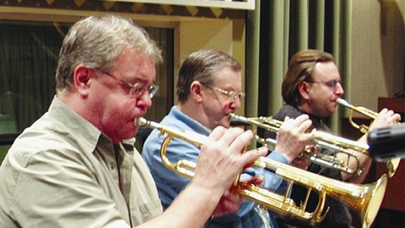 Derek Watkins (left) playing lead trumpet with the BBC Big Band at the Maida Vale Studios, London.