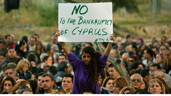 housands of bank employees protest outside the Finance Ministry in Nicosia