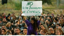 housands of bank employees protest outside the Finance Ministry in Nicosia