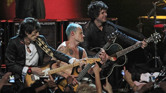Ronnie Wood, Mike "Flea" Balazary and Billy Joe Armstrong perform in the finale of the 2012 Rock and Roll Hall of Fame inductions.
