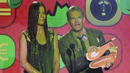 Sandra Bullock composes herself as fellow slime victim Neil Patrick Harris reveals the Favourite Movie Actress winner.