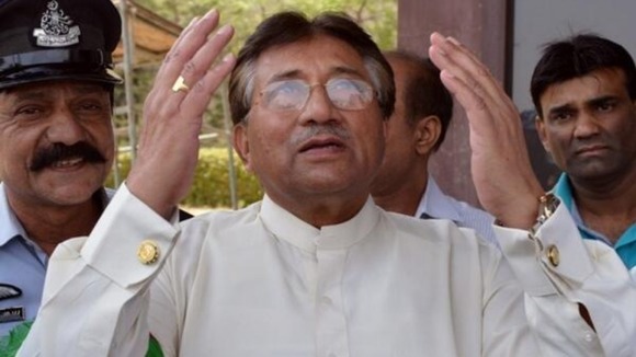 Pakistan's former president Pervez Musharraf praying on arrival in Karachi