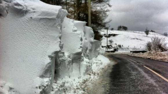 Snow has been cleared from a road in Northern Ireland.