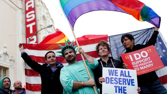 ame-sex marriage supporters take part in a march in support of gay marriage in San Francisco