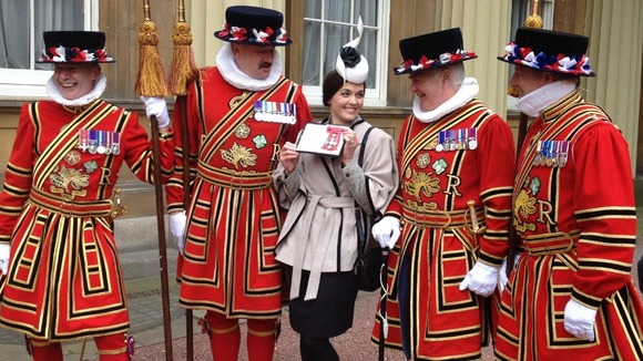 Victoria Pendleton pictured with Beefeaters after receiving her CBE>