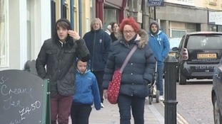 People in jackets in Tenby