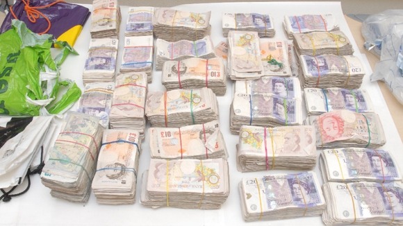 This cash was seized by police off the M62 in Leeds.