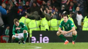 Republic of Ireland's Glenn Whelan and Sean St Ledger sit dejected after defeat to Austria