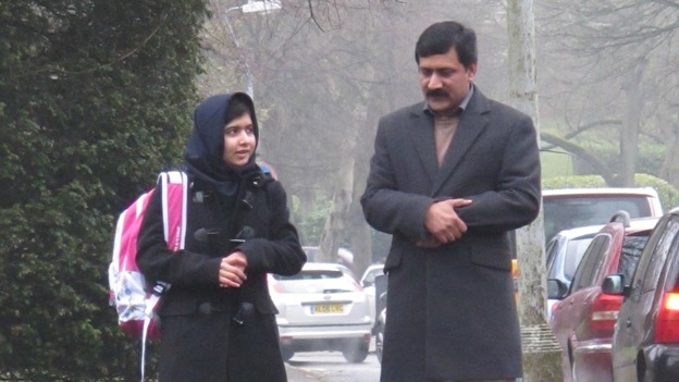 Malala Yousufzai and her father Ziauddin on her first day of school in the UK