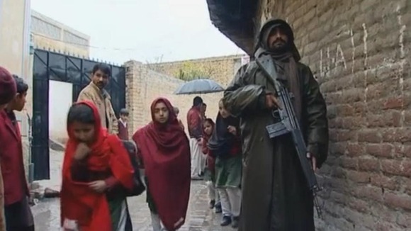 Schoolgirls in Pakistan's Swat Valley go to school under armed guard