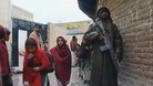 Schoolgirls in Pakistan's Swat Valley go to school under armed guard