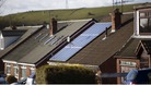 A house in Stalybridge, Manchester with solar panels installed on the roof