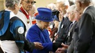 The Queen hands out Maundy money at the Christ Church Cathedral, Oxford.