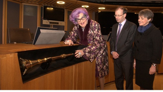 Dame Edna with the Senedd's mace