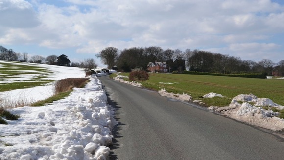 Partial snowmelt by roadside in Stonnall, Staffordshire.