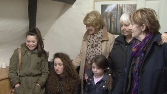 Coventry Irish Society members inspect the cushion