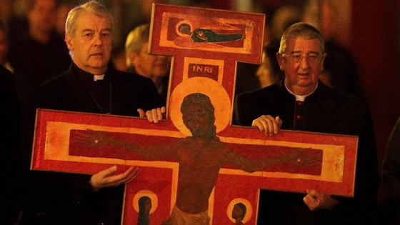 Church of Ireland Archbishop Michael Jackson and Catholic Archbishop Diarmuid Martin jointly carry a cross